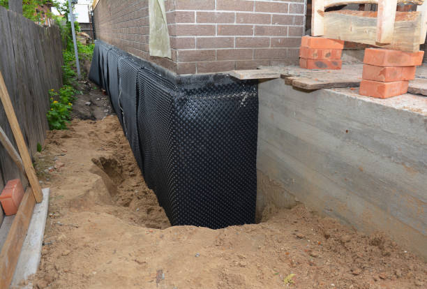 SJ Waterproofing Pros technician performing targeted Vapor Barrier Installation assessment in North Brunswick, NJ